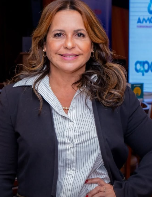 Profissional da liderança da Amoedo em ambiente corporativo